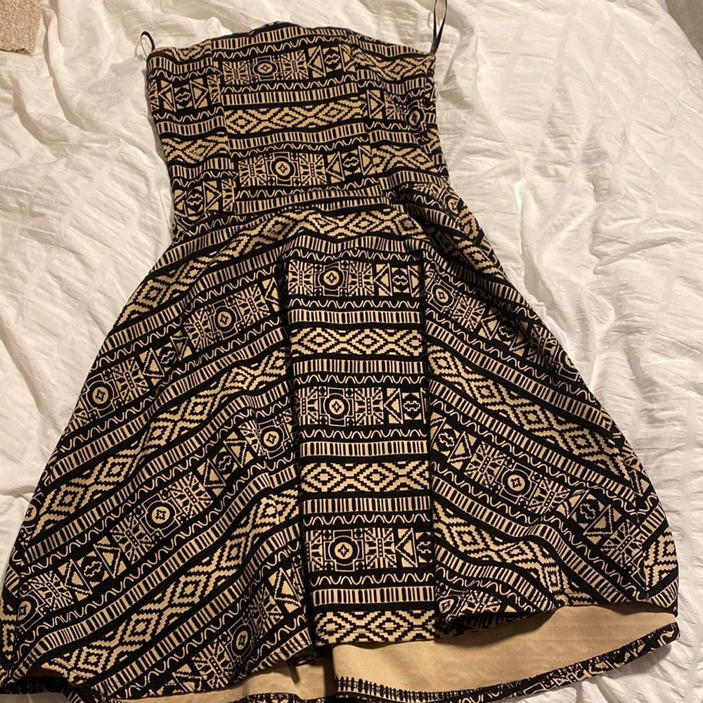 gold and black tight dress